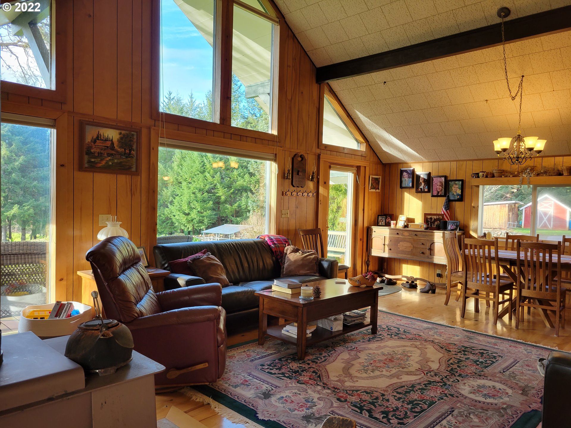 5064 Henderer Road Elkton, OR 97436 - Photo 5 of 32 a living room with furniture and a large window