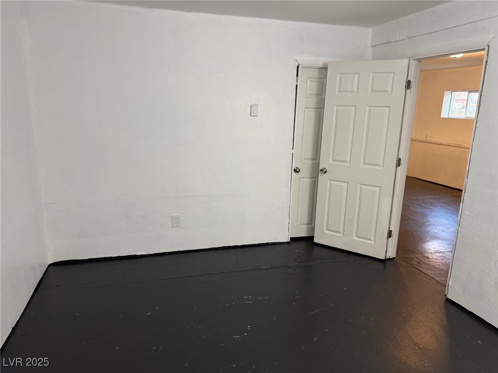 27 Carson Court Ely, NV 89301 - Photo 18 of 22 Unfurnished room with finished concrete floors