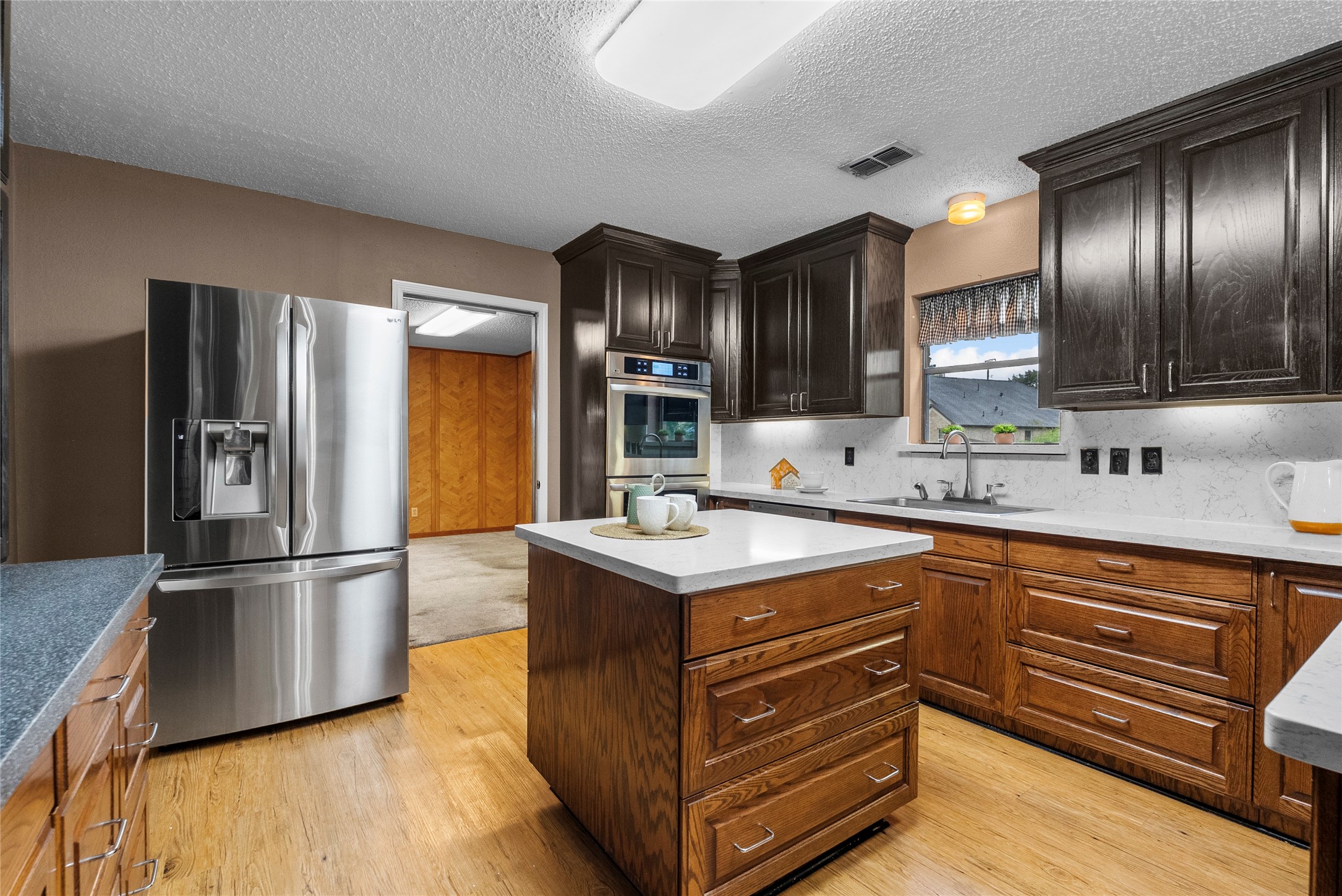 422 Rice Avenue Arcola, TX 77583 - Photo 6 of 33 Spacious kitchen perfect for hosting holiday gatherings, family dinners, and entertaining guests