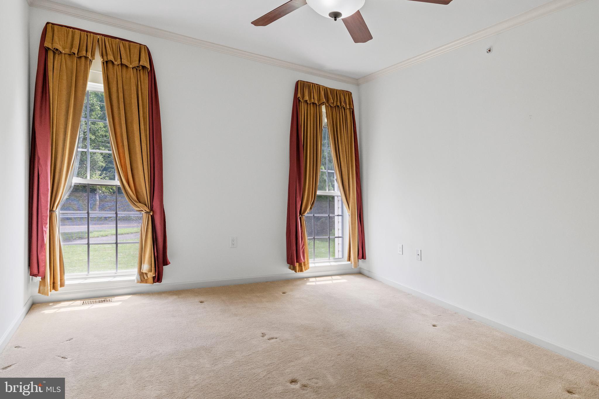 815 Geranium Drive Warrington, PA 18976 - Photo 15 of 33 an empty room with windows and wooden floor