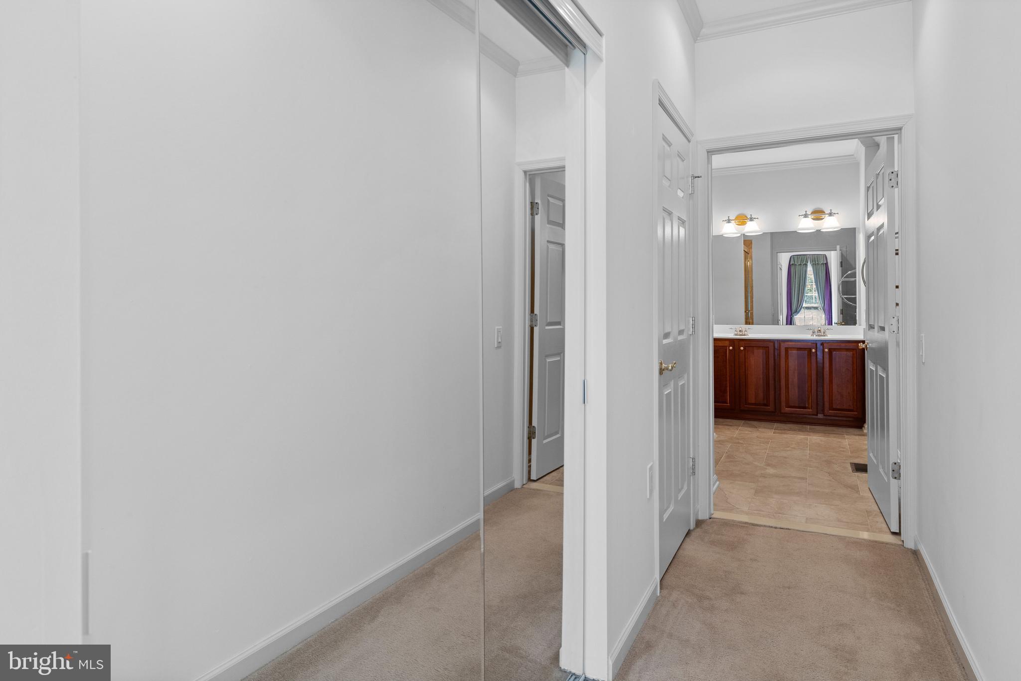 815 Geranium Drive Warrington, PA 18976 - Photo 16 of 33 a view of a hallway with kitchen and wooden floor