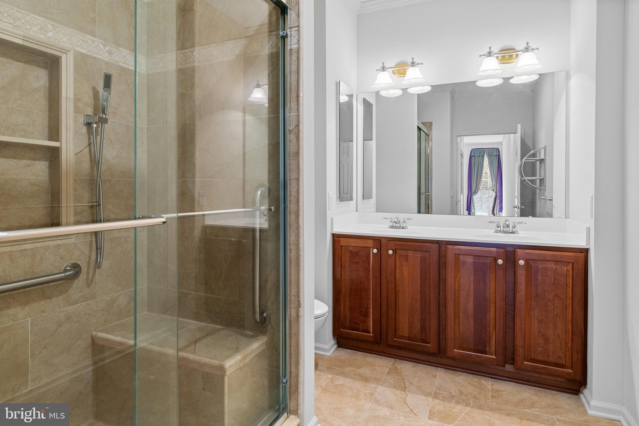 815 Geranium Drive Warrington, PA 18976 - Photo 17 of 33 a bathroom with a mirror a sink and shower
