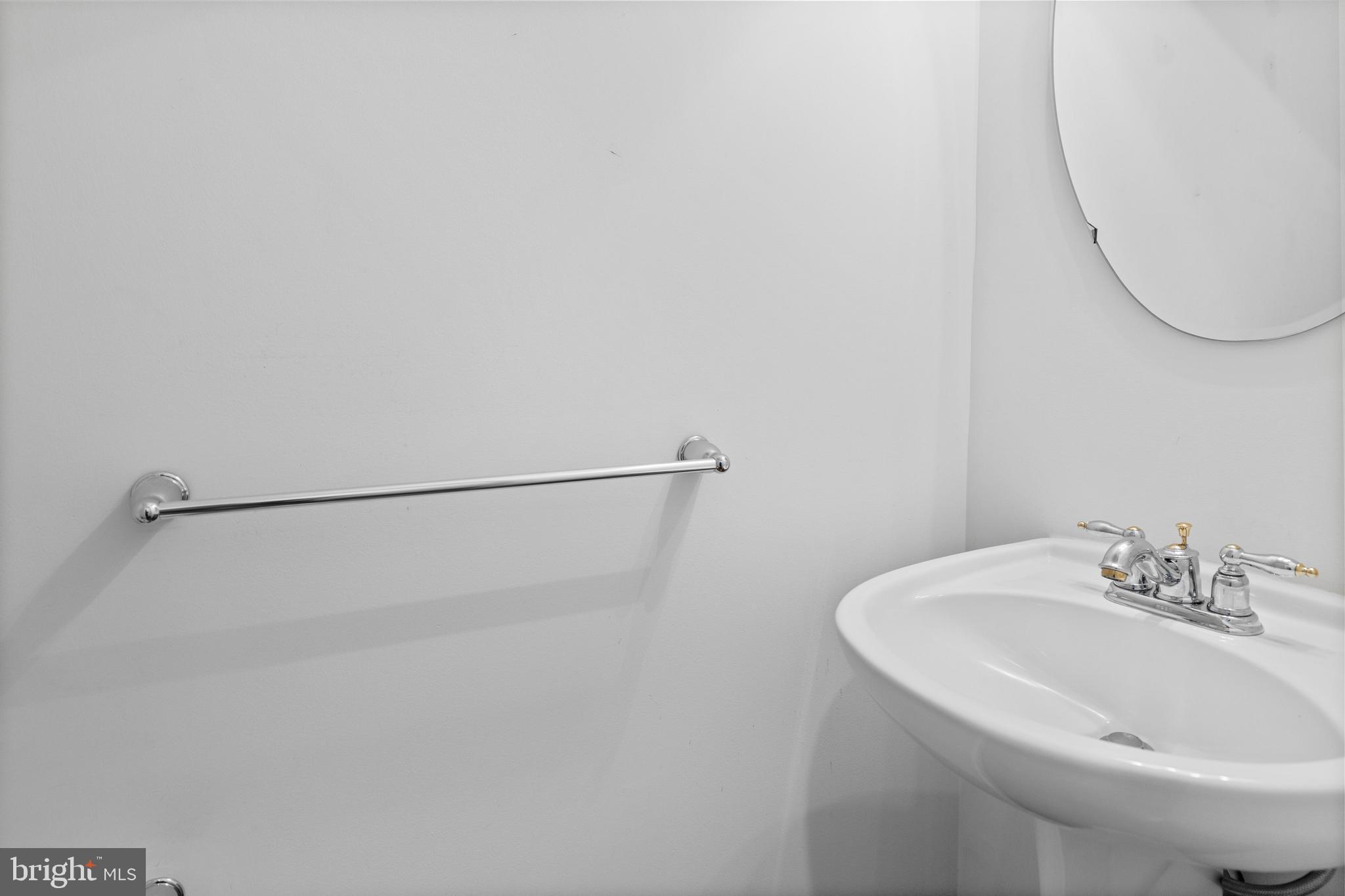 815 Geranium Drive Warrington, PA 18976 - Photo 19 of 33 a bathroom with a sink a mirror and a shower