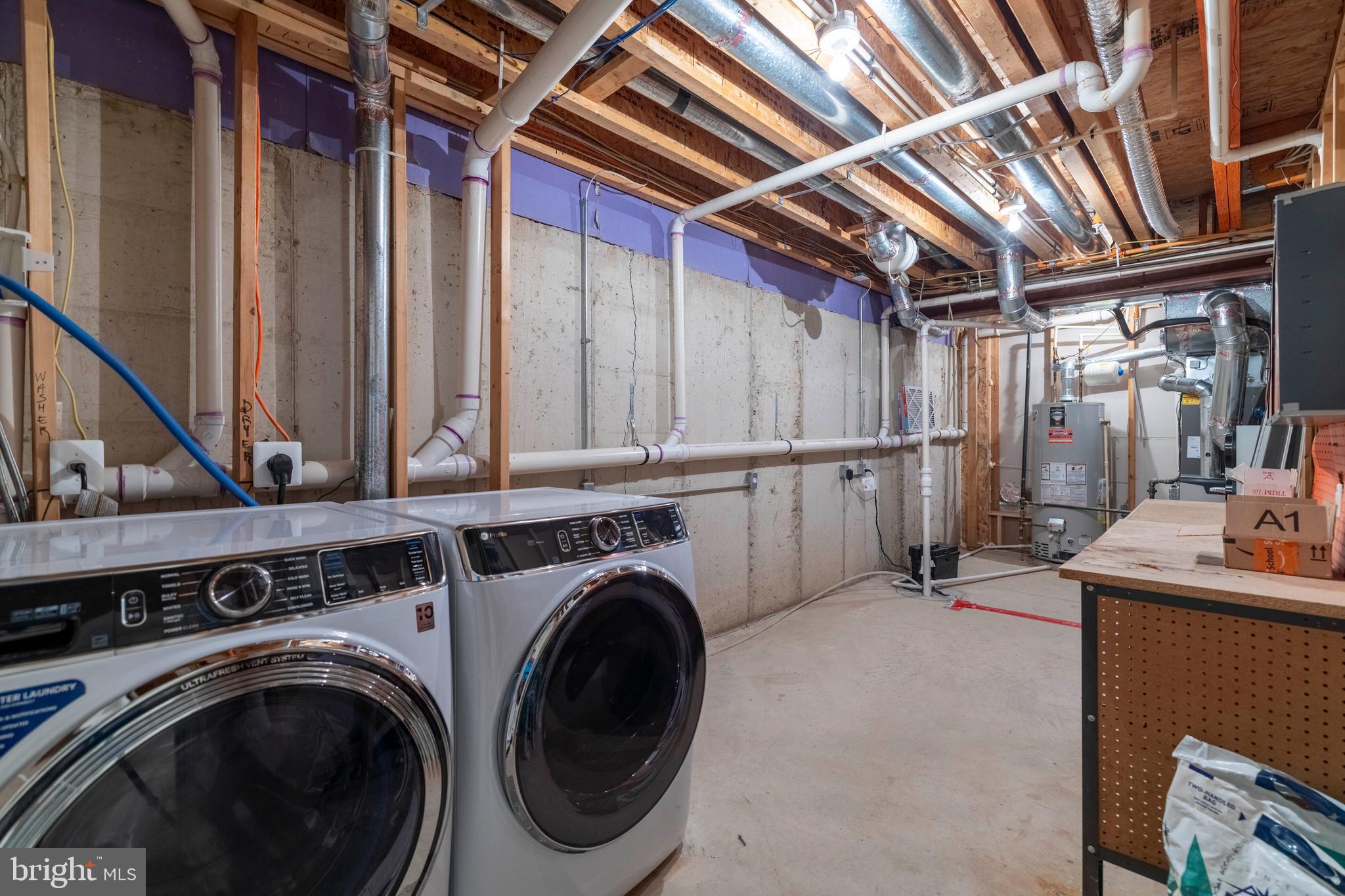 815 Geranium Drive Warrington, PA 18976 - Photo 31 of 33 a view of a storage & utility room with washer and dryer