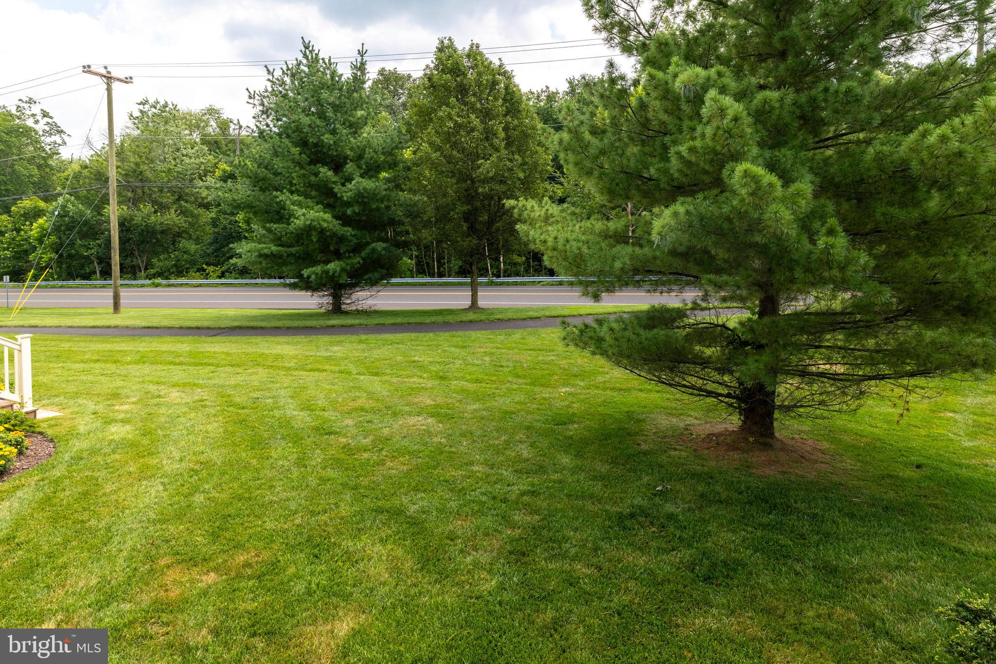815 Geranium Drive Warrington, PA 18976 - Photo 33 of 33 a view of a swimming pool with a yard