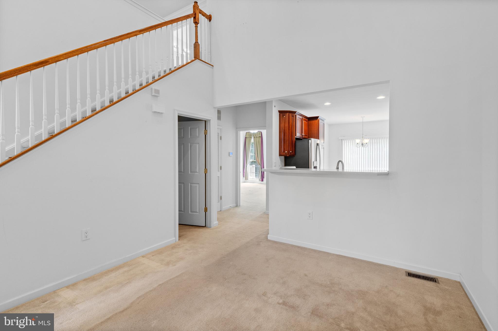 815 Geranium Drive Warrington, PA 18976 - Photo 6 of 33 a view of a hallway with wooden floor and entryway