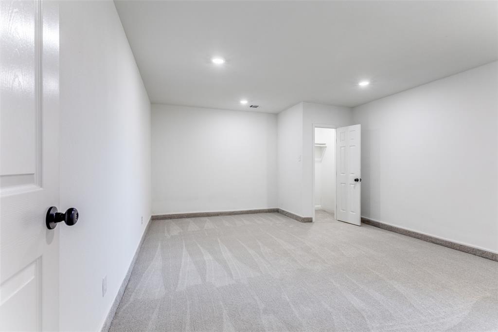 7609 Walnuthill Court Watauga, TX 76148 - Photo 13 of 22 a view of an empty room