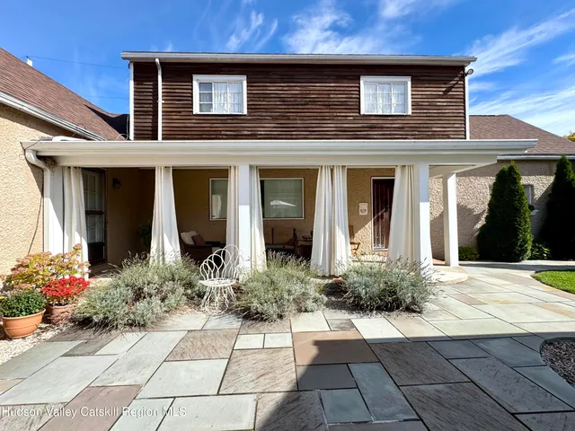 a house view with a outdoor space
