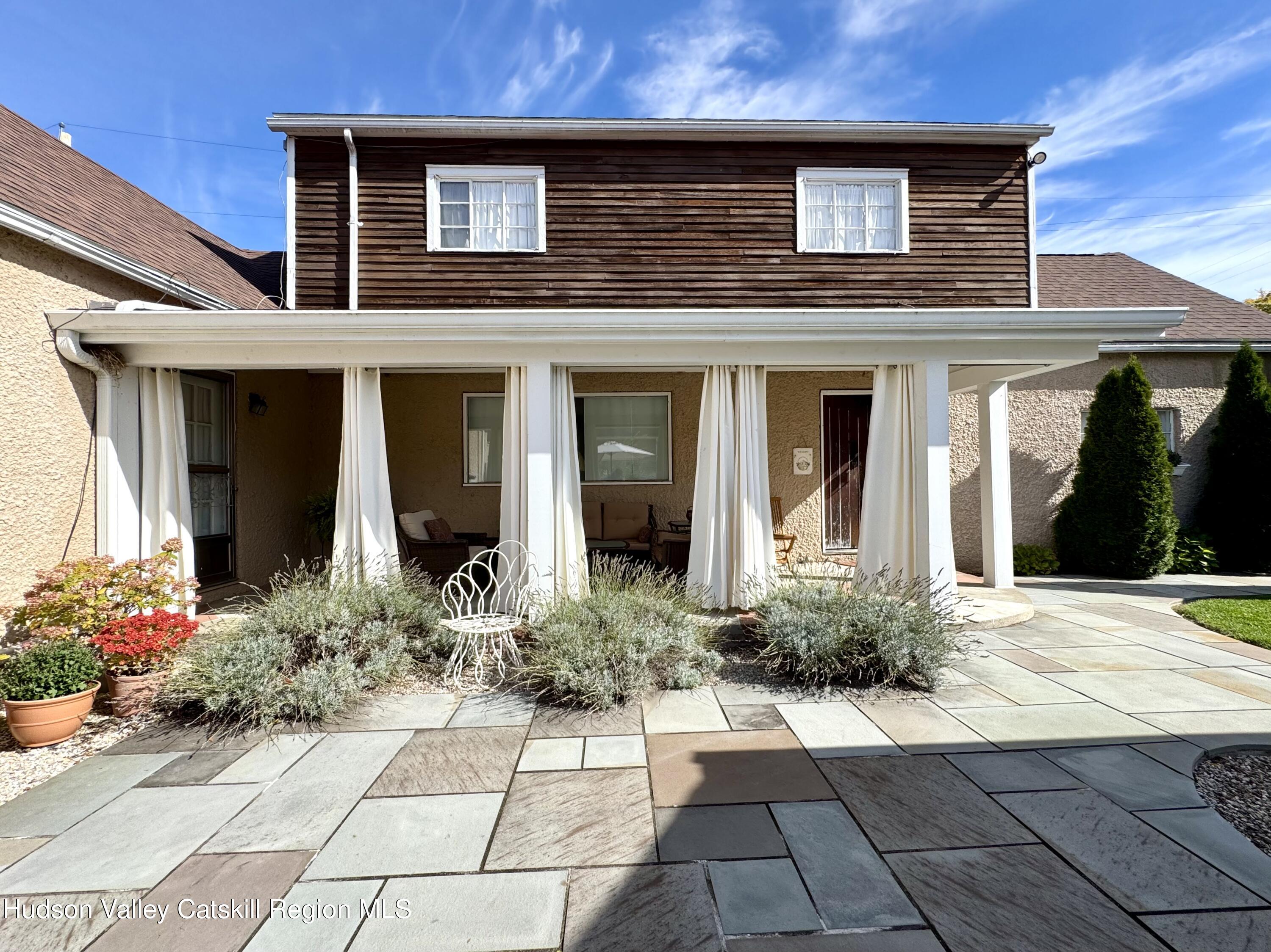 a house view with a outdoor space