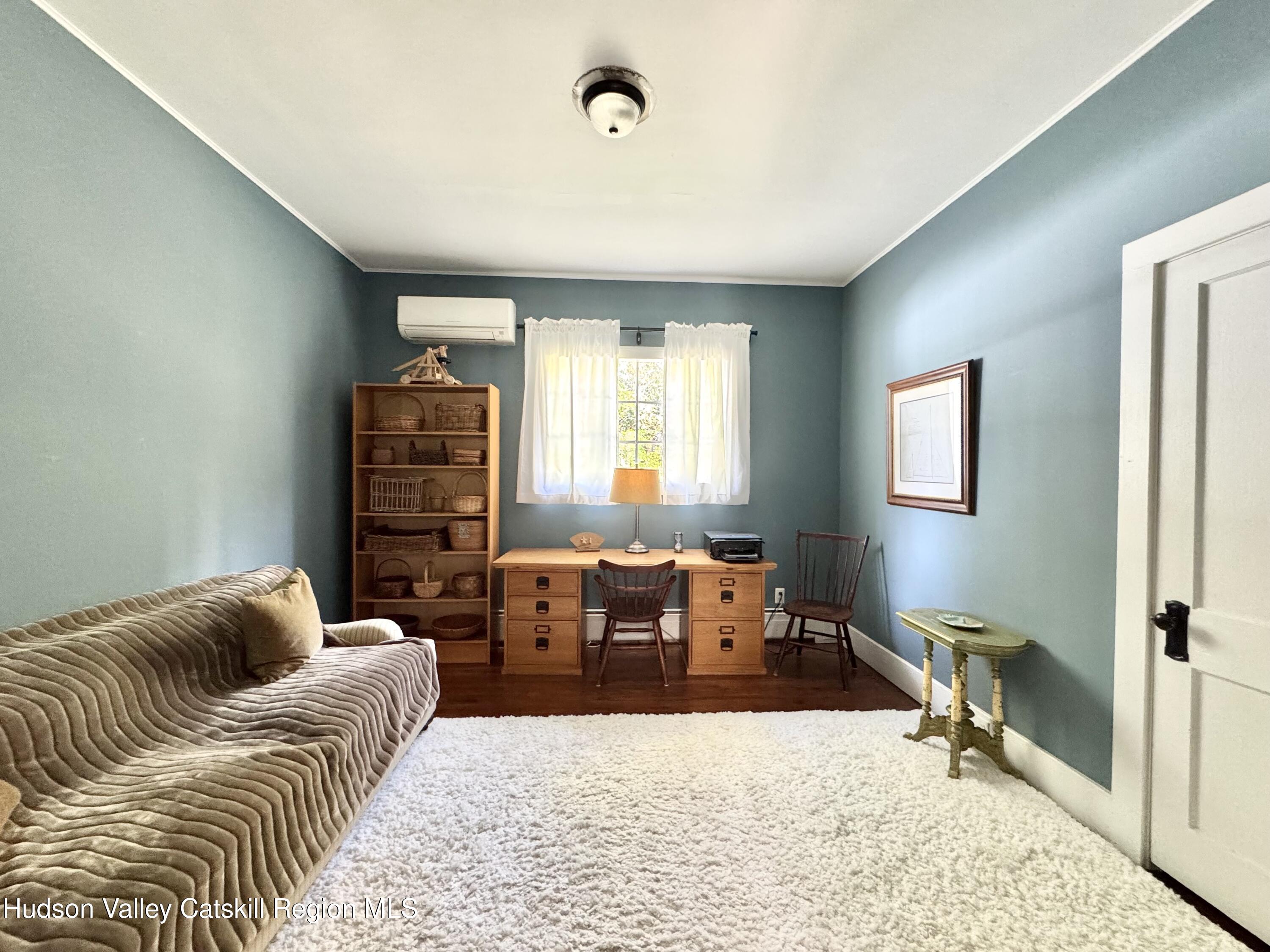 121 High Street Catskill, NY 12414 - Photo 14 of 29 a living room with furniture or couch and a window