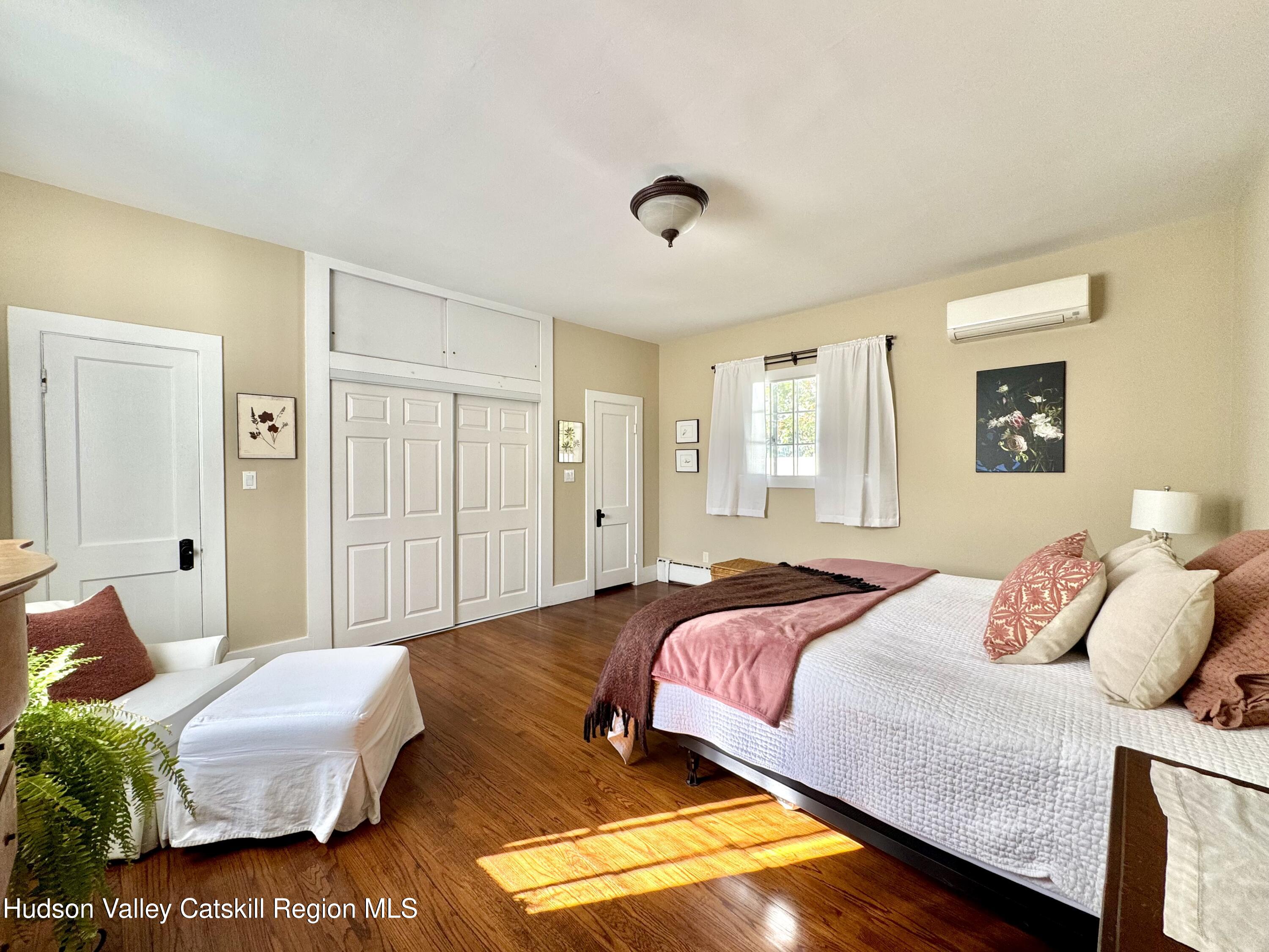 121 High Street Catskill, NY 12414 - Photo 17 of 29 a bedroom with a bed and a couch