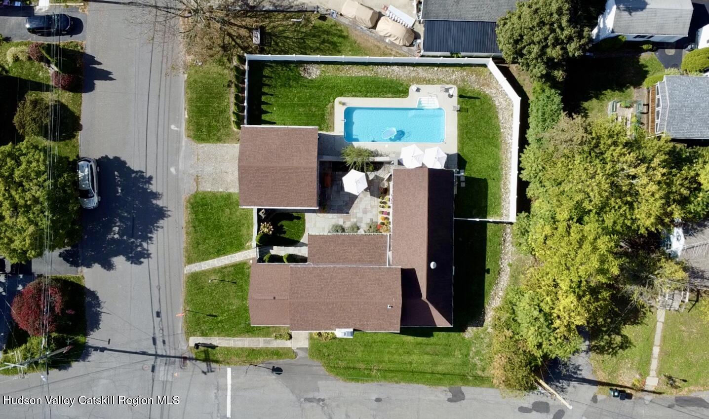 121 High Street Catskill, NY 12414 - Photo 25 of 29 an aerial view of a house with a yard and large tree