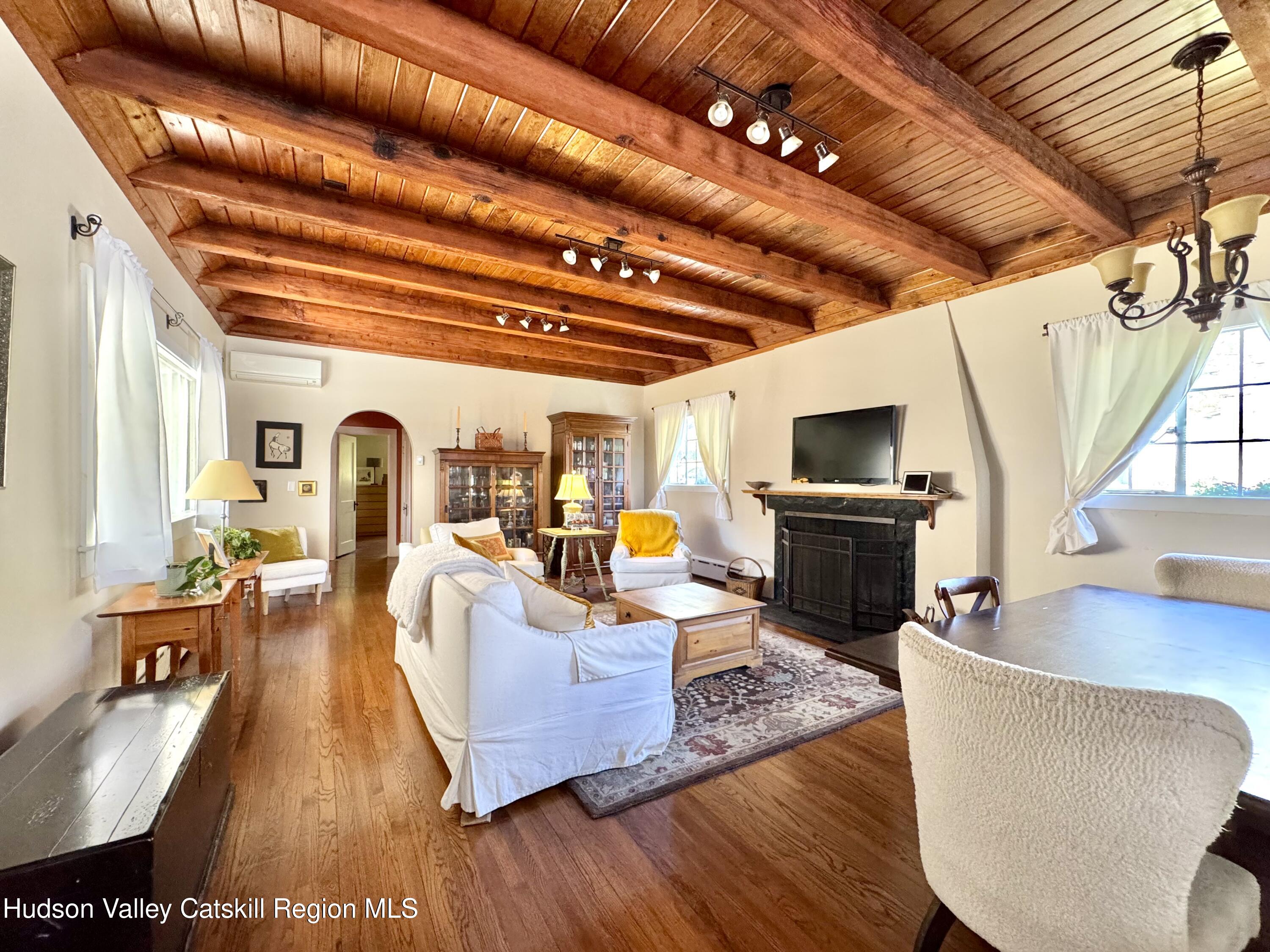 121 High Street Catskill, NY 12414 - Photo 6 of 29 a living room with furniture and a flat screen tv