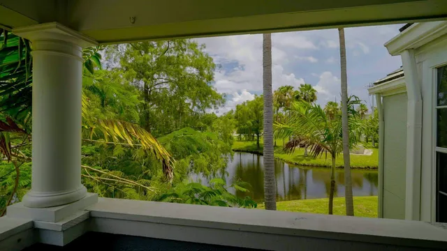 a view of swimming pool from a window