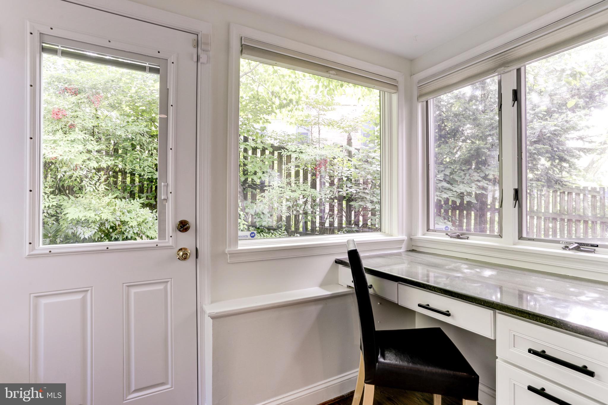 4700 Reservoir Road Northwest Washington, DC 20007 - Photo 20 of 36 a view of a window and a kitchen from the sink