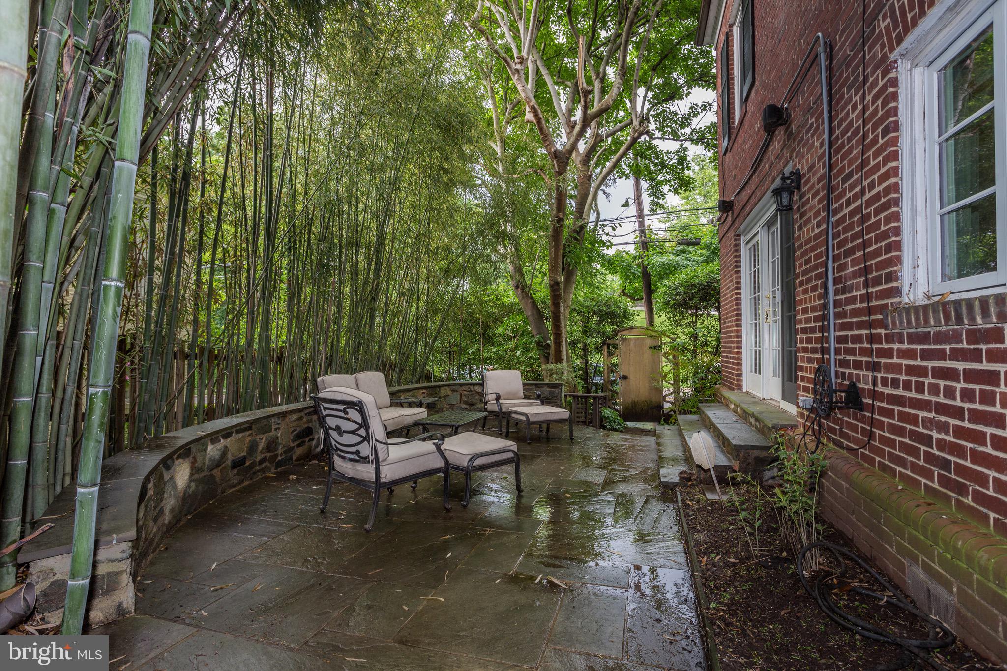 4700 Reservoir Road Northwest Washington, DC 20007 - Photo 29 of 36 a view of a patio with table and chairs and potted plants