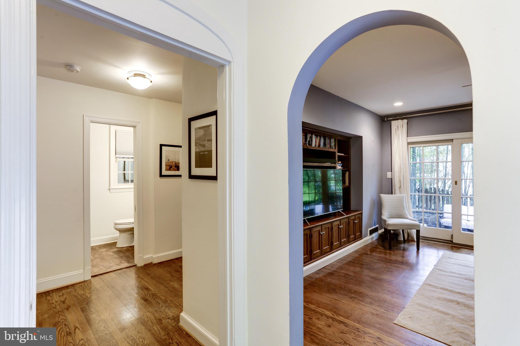 4700 Reservoir Road Northwest Washington, DC 20007 - Photo 4 of 36 a view of a room with wooden floor and furniture