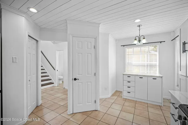 a view of a bedroom with windows
