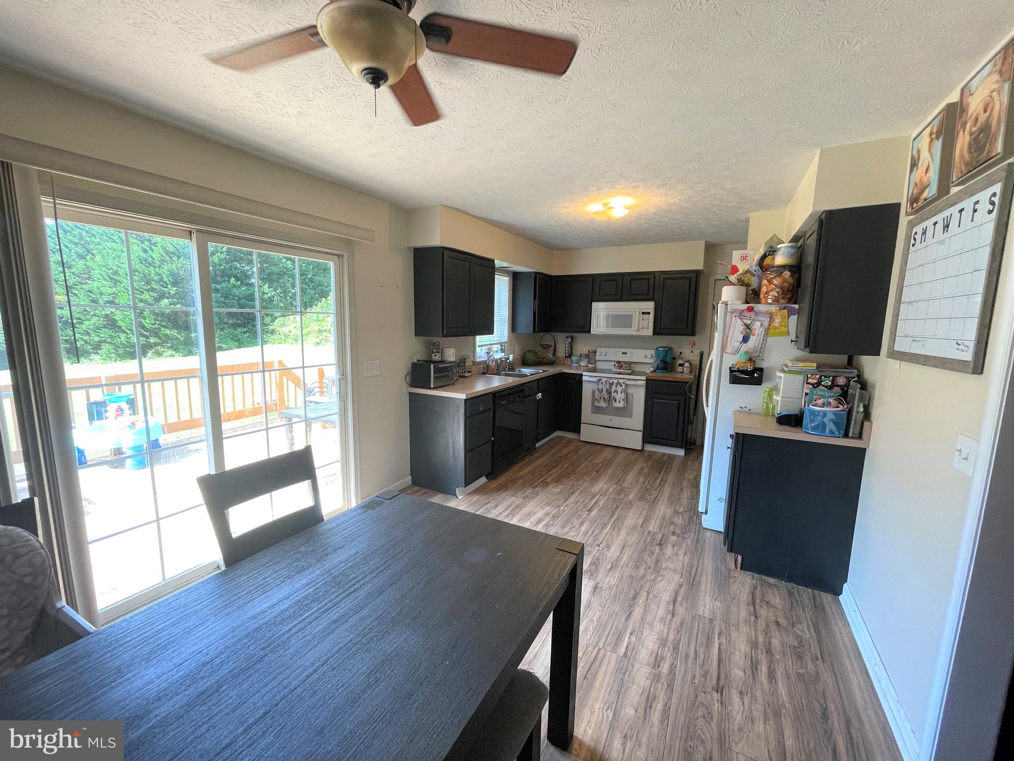 396 Ridge Road Rising Sun, MD 21911 - Photo 8 of 26 Kitchen w/ slider to rear deck