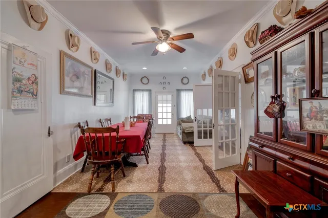 a view of a livingroom with furniture and a rug