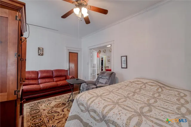 a bed room with a bed and a couch