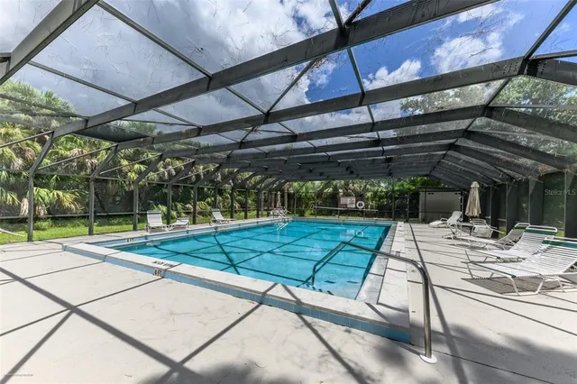 a view of a backyard with a patio