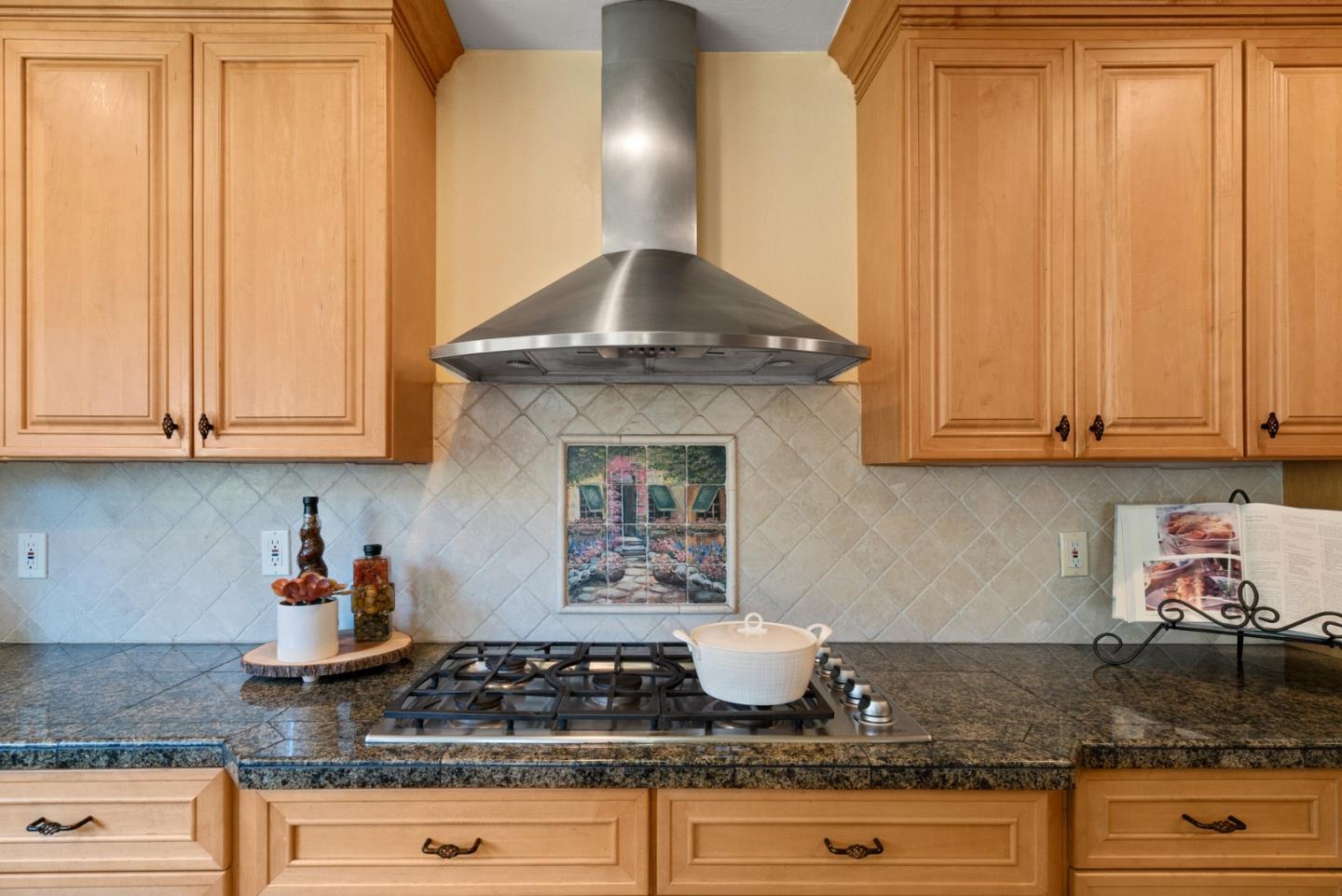 380 Sims Road Santa Cruz, CA 95060 - Photo 16 of 72 a kitchen with granite countertop a stove a sink and cabinets