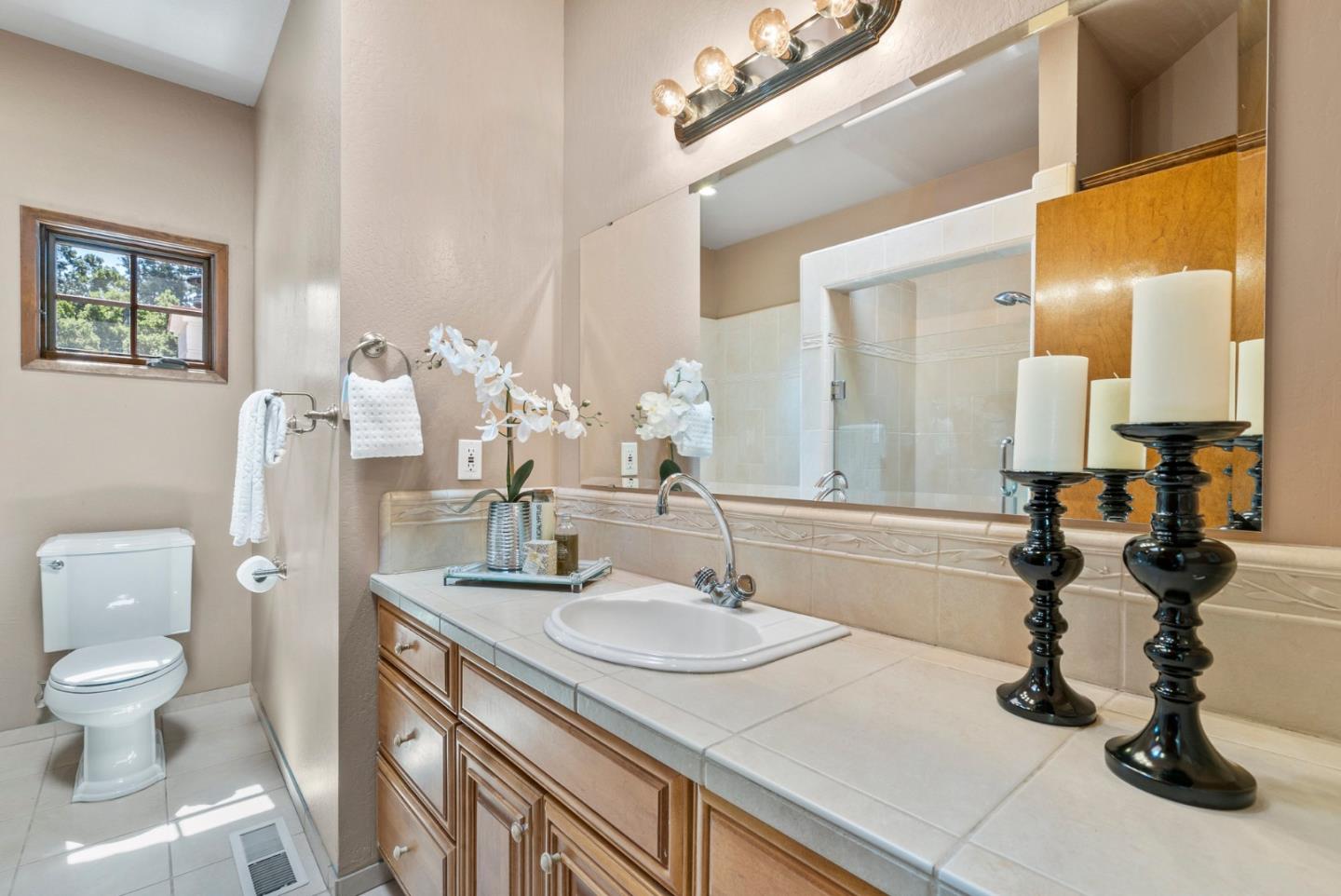 380 Sims Road Santa Cruz, CA 95060 - Photo 23 of 72 a bathroom with a sink double vanity and a toilet