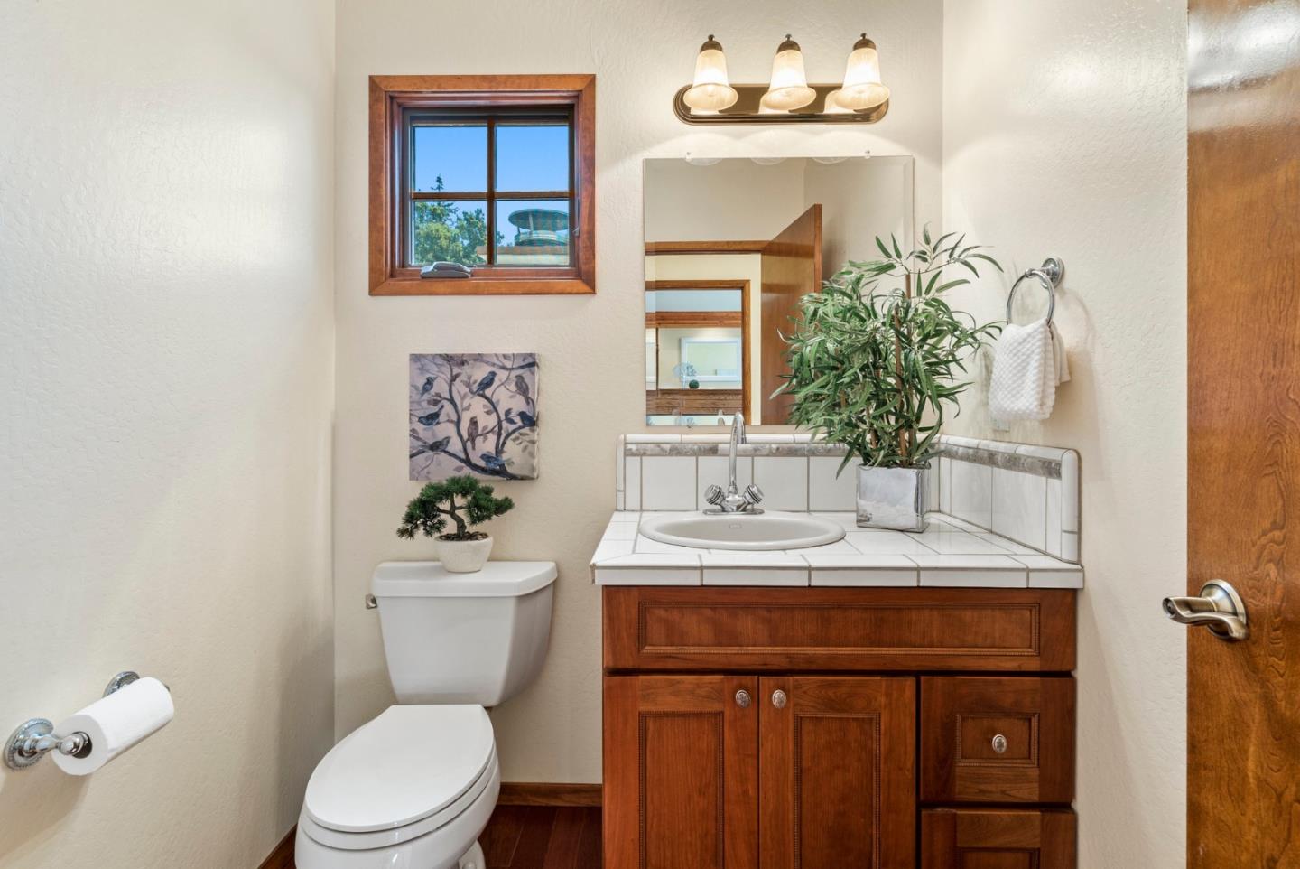 380 Sims Road Santa Cruz, CA 95060 - Photo 33 of 72 a bathroom with a sink a toilet and a mirror