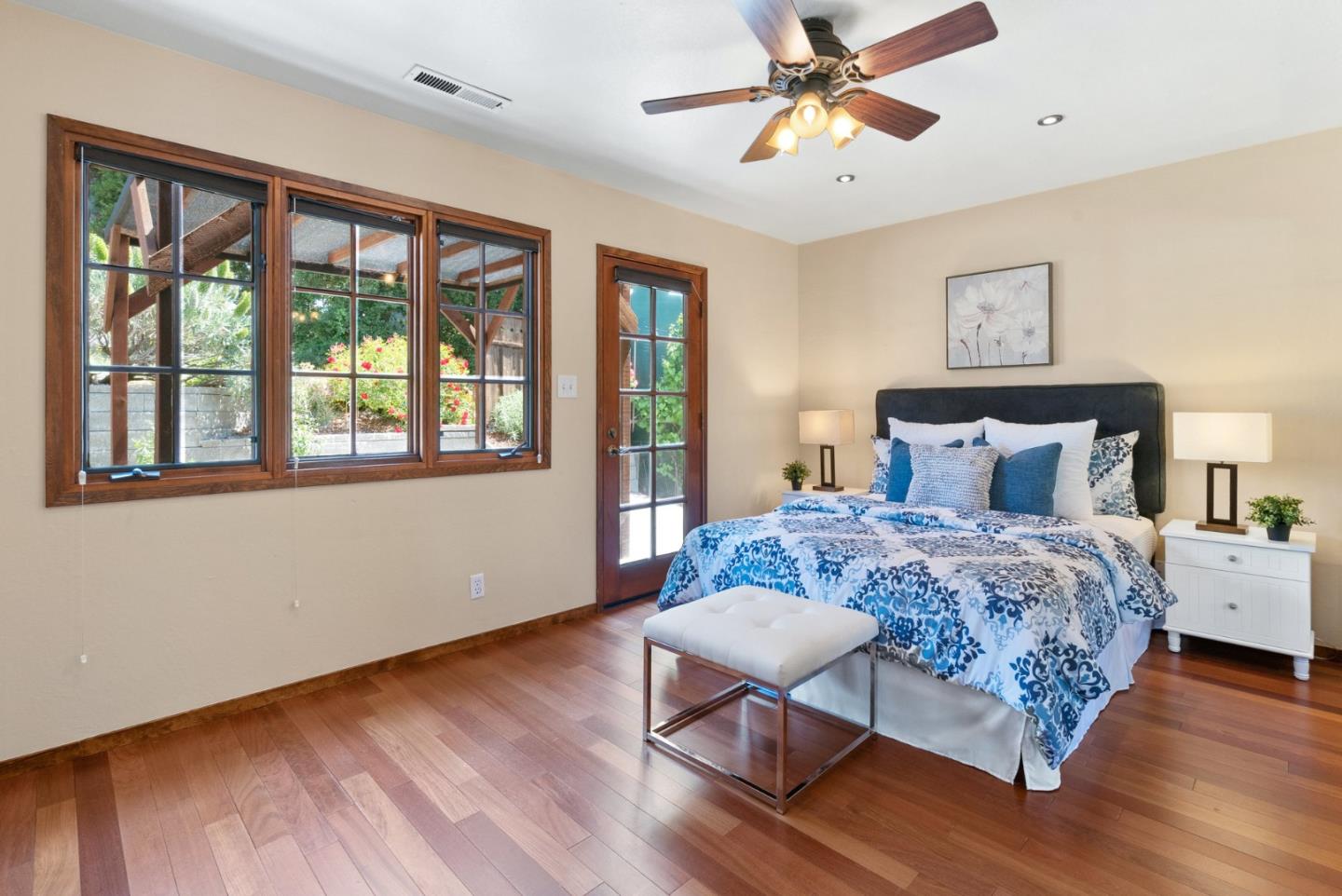 380 Sims Road Santa Cruz, CA 95060 - Photo 35 of 72 a bedroom with a bed and wooden floor