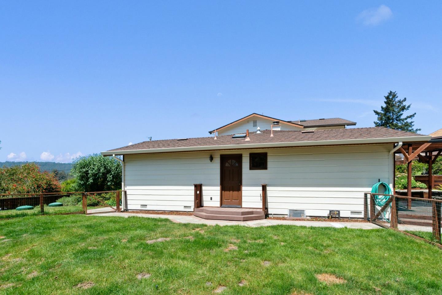 380 Sims Road Santa Cruz, CA 95060 - Photo 55 of 72 a front view of a house with a garden and yard