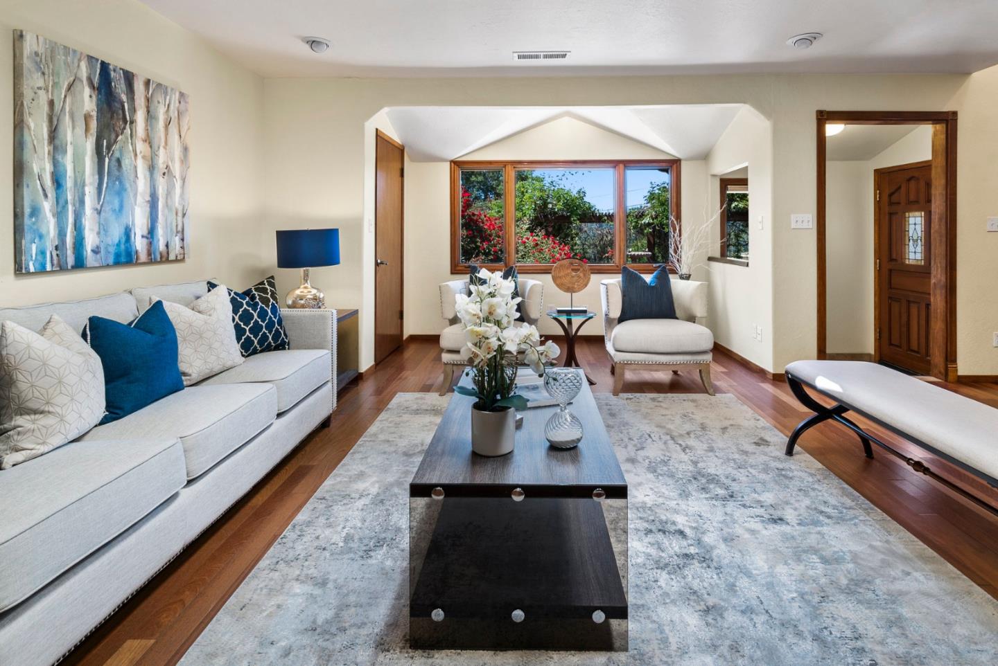 380 Sims Road Santa Cruz, CA 95060 - Photo 6 of 72 a living room with furniture and a large mirror next to a window