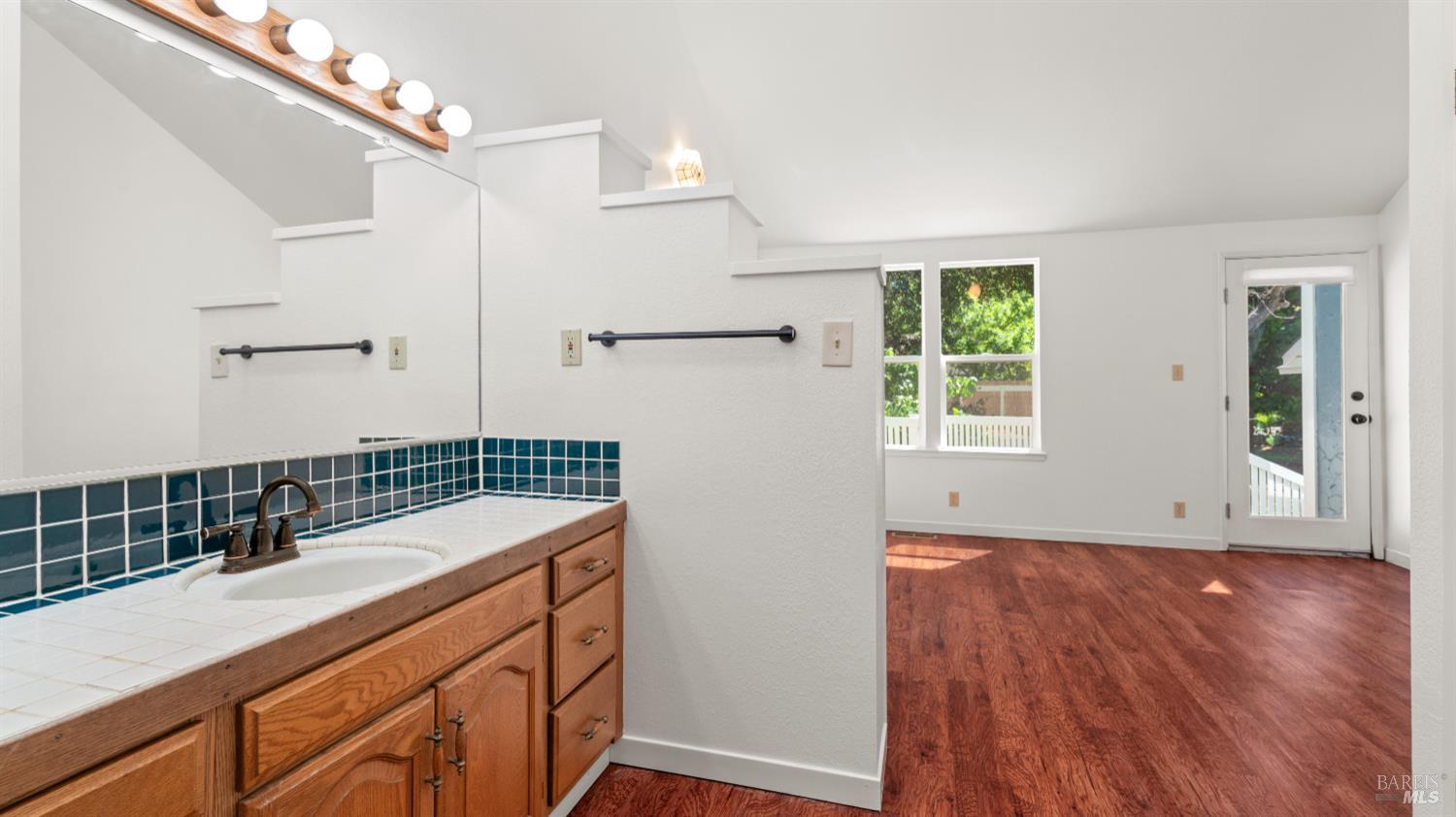 1160 Carr Avenue Santa Rosa, CA 95404 - Photo 26 of 56 a bathroom with a sink and a mirror