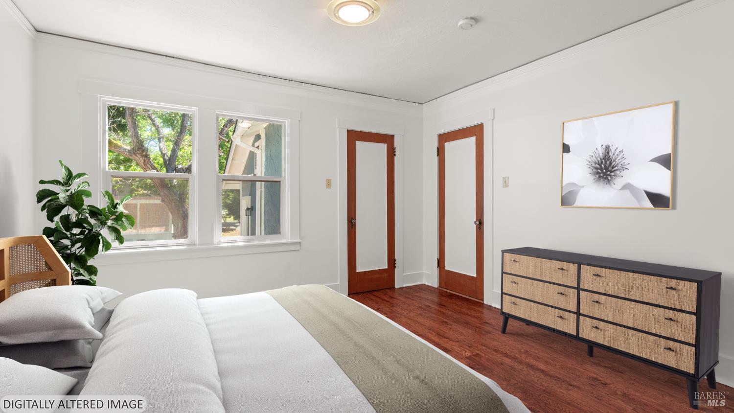 1160 Carr Avenue Santa Rosa, CA 95404 - Photo 27 of 56 a bedroom with a bed and a window with wooden floor