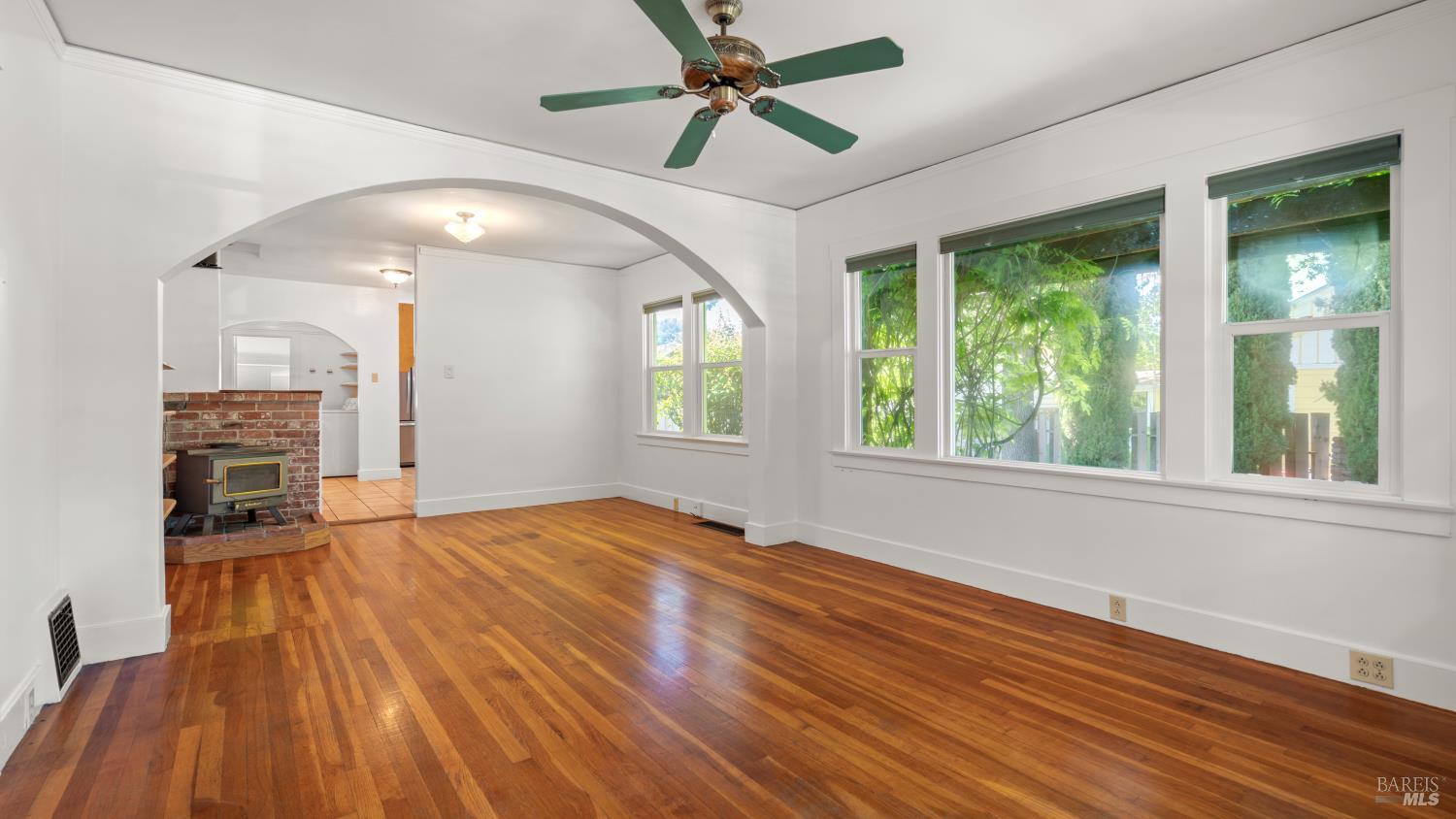 1160 Carr Avenue Santa Rosa, CA 95404 - Photo 8 of 56 a view of an empty room with a window and wooden floor