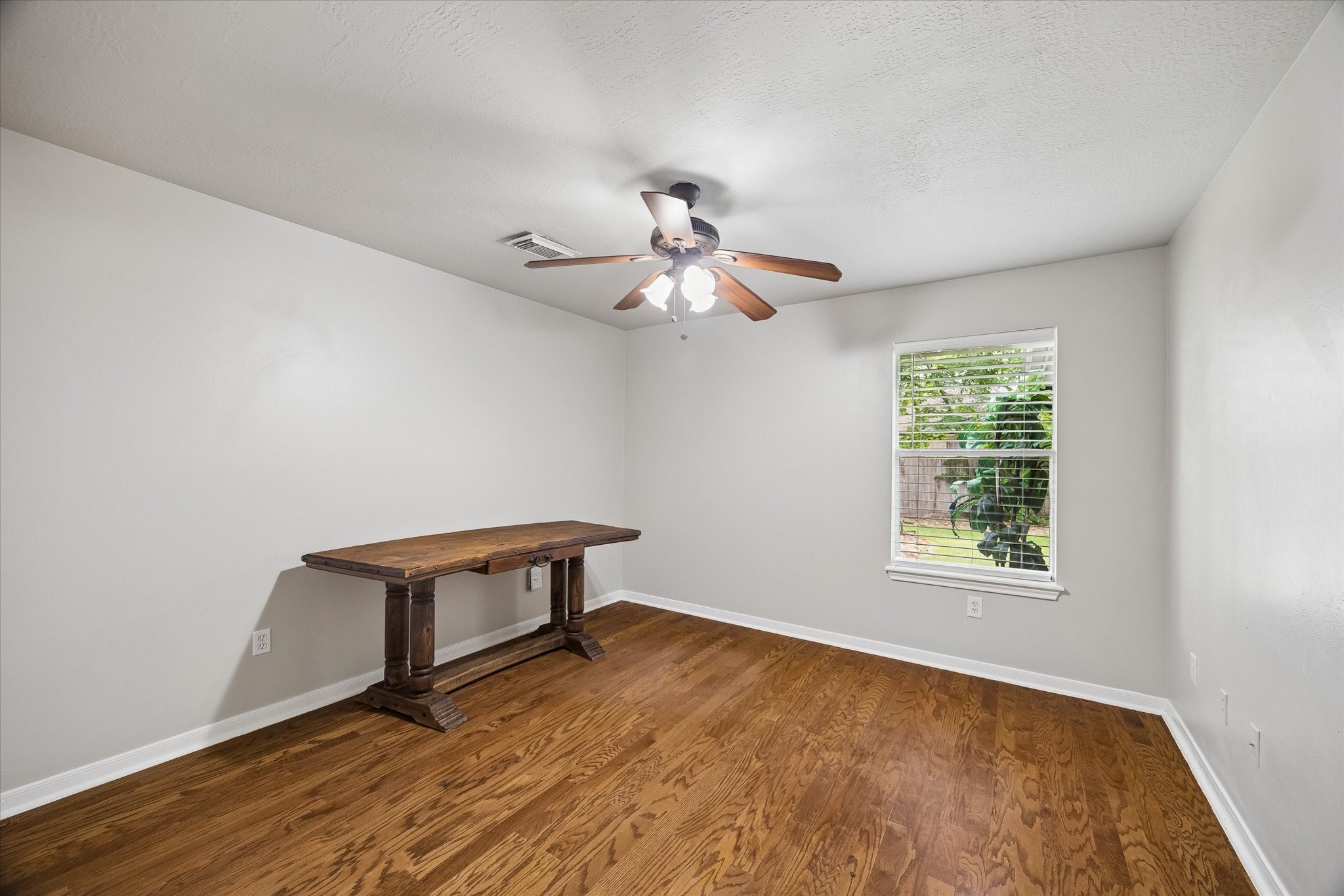 109 Dawns Edge Conroe, TX 77356 - Photo 14 of 24 a view of an empty room with a window
