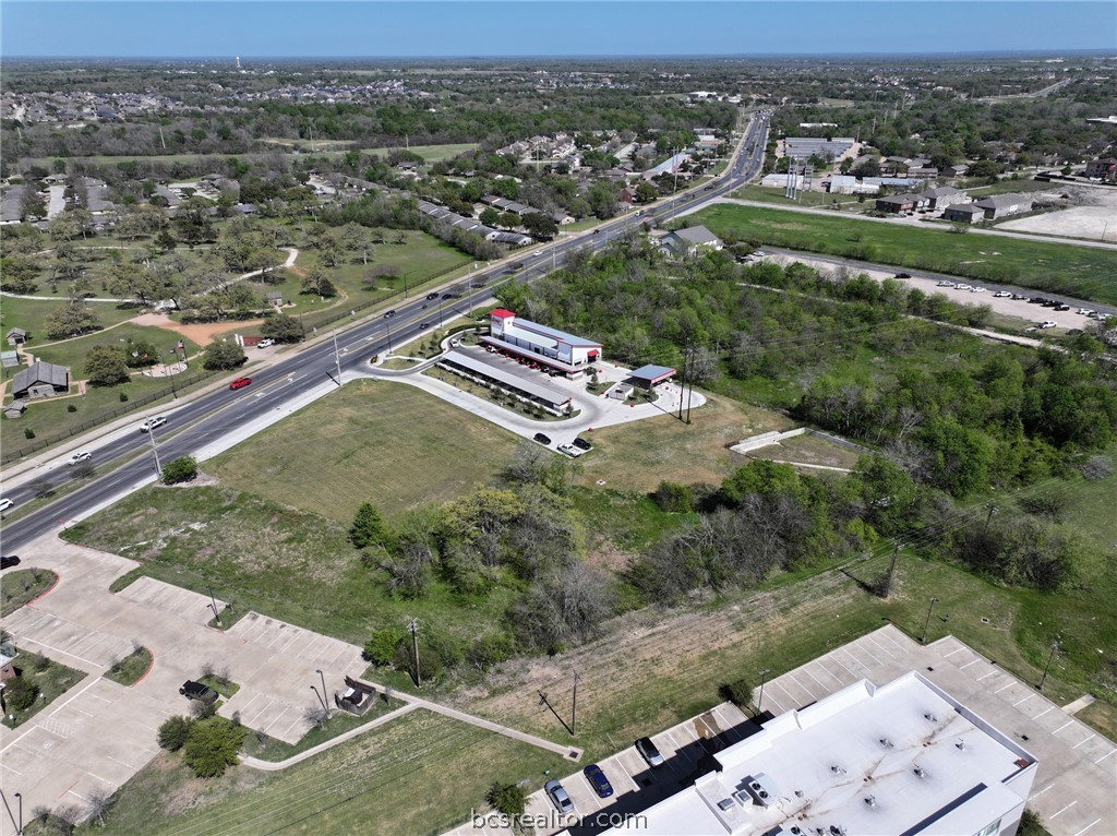 2414 Boonville Road Bryan, TX 77808 - Photo 6 of 9 an aerial view of residential houses with outdoor space