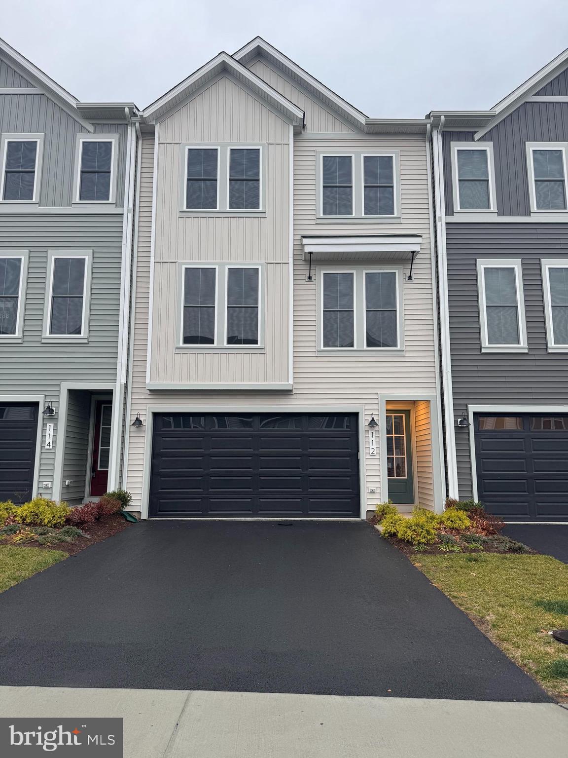 112 Galaxy Place Stephenson, VA 22656 - Photo 1 of 31 a front view of a house with a yard