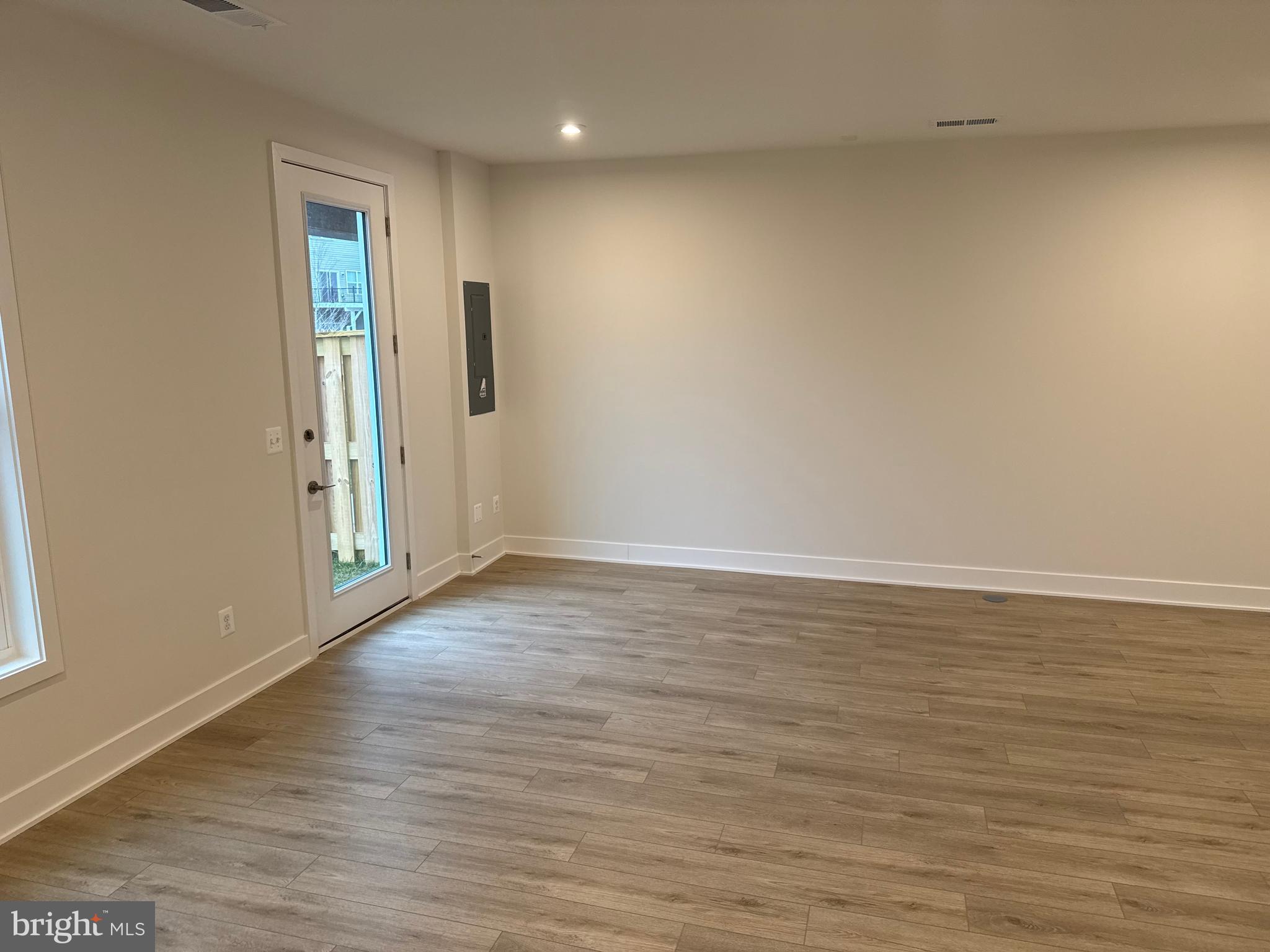 112 Galaxy Place Stephenson, VA 22656 - Photo 28 of 31 a view of an empty room with wooden floor and entrance