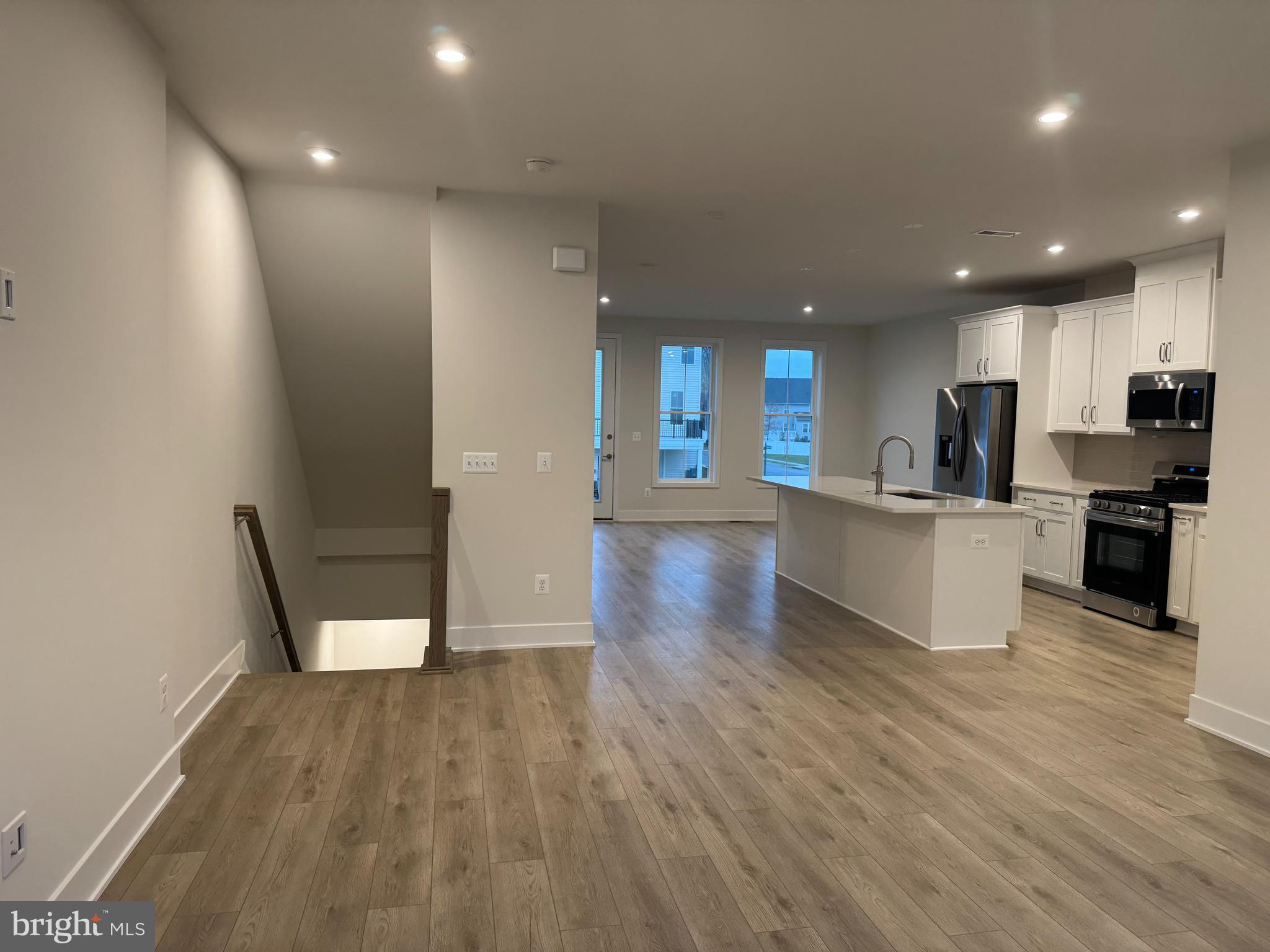 112 Galaxy Place Stephenson, VA 22656 - Photo 9 of 31 a view of kitchen with cabinets and wooden floor