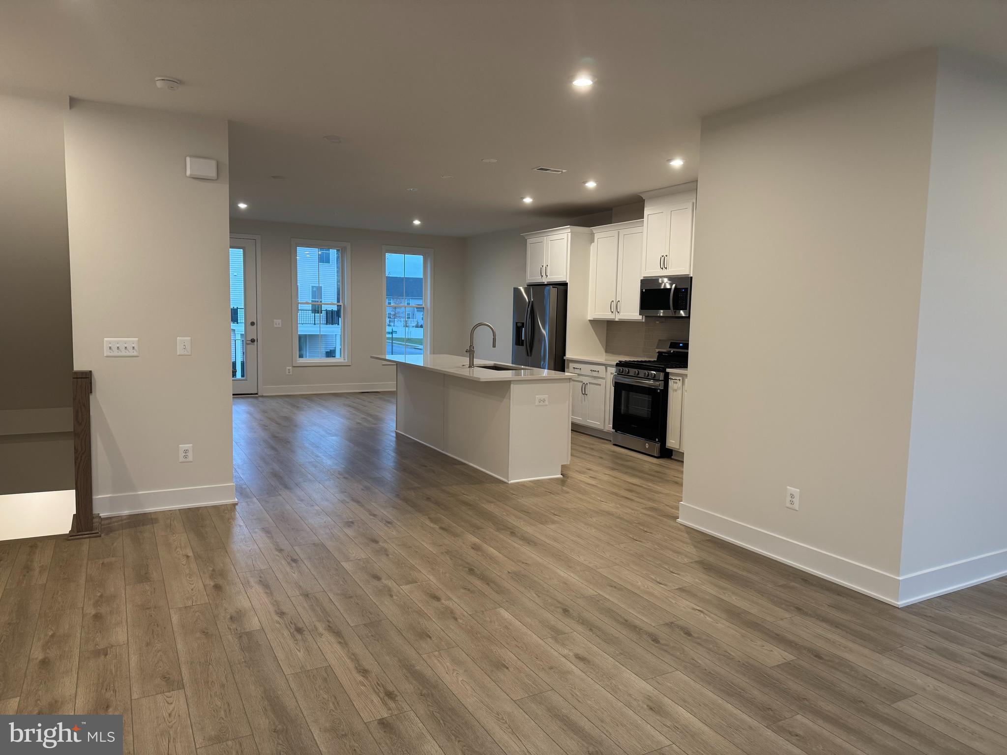 112 Galaxy Place Stephenson, VA 22656 - Photo 10 of 31 a view of kitchen view wooden floor and stainless steel appliances