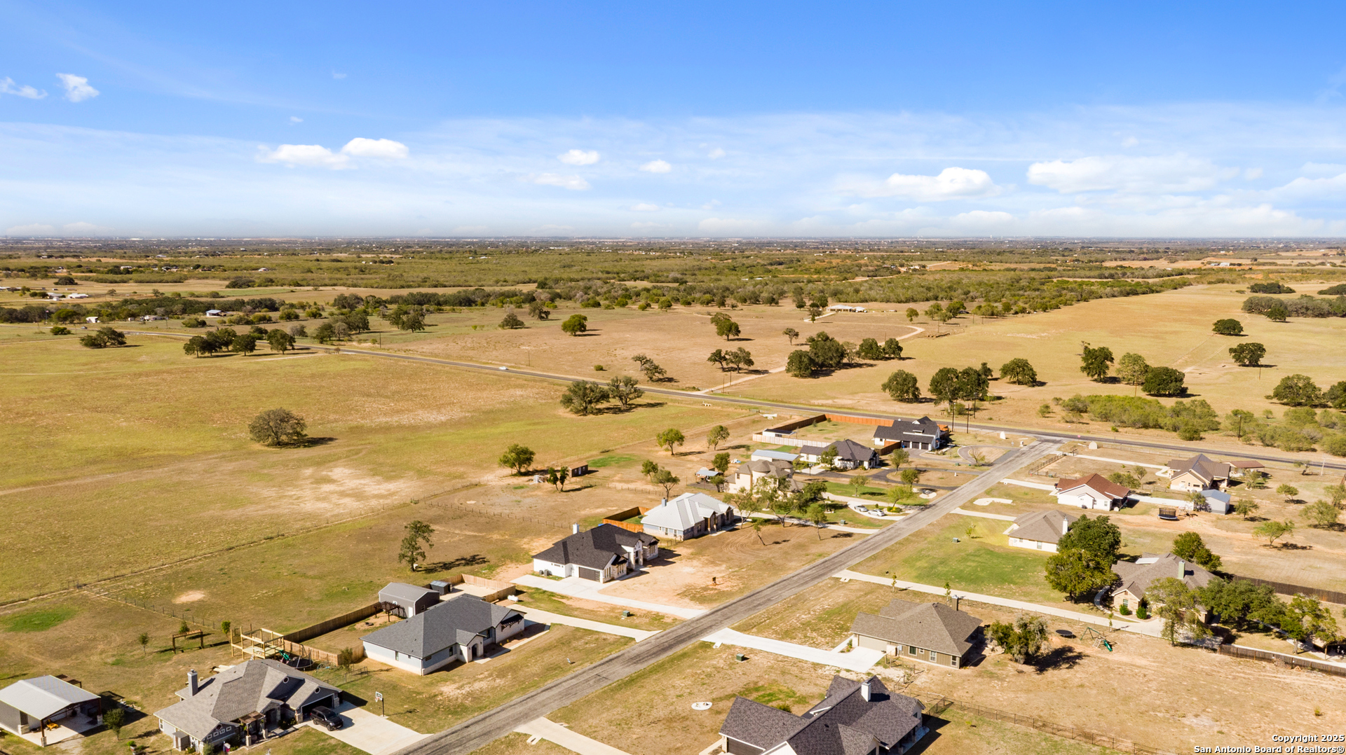 116 Western Way Adkins, TX 78101 - Photo 3 of 50 an aerial view of ocean and residential houses with outdoor space