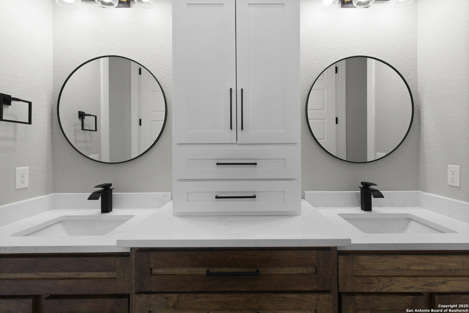 116 Western Way Adkins, TX 78101 - Photo 39 of 50 a bathroom with a sink and a mirror