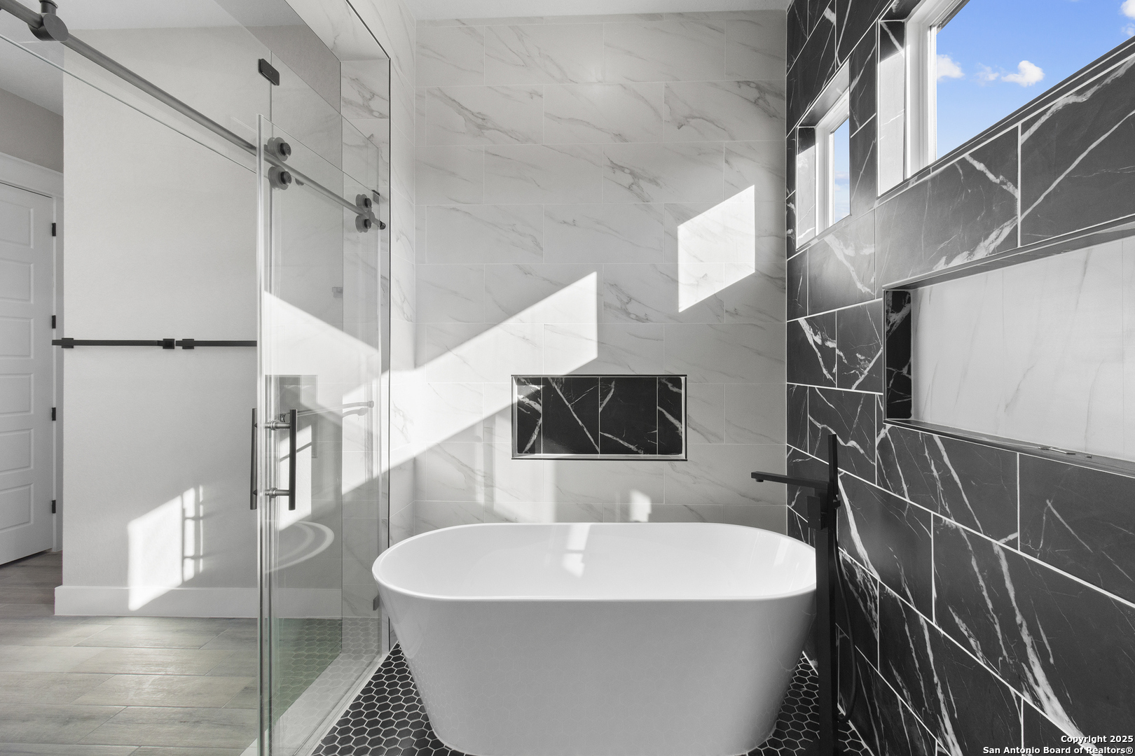 116 Western Way Adkins, TX 78101 - Photo 43 of 50 a white bath tub sitting next to a white wall