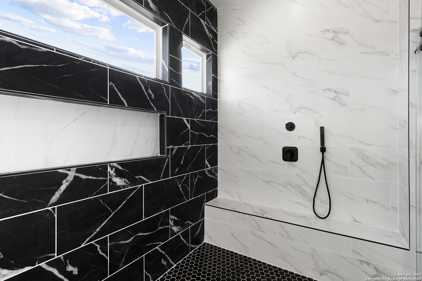 116 Western Way Adkins, TX 78101 - Photo 44 of 50 a bathroom with a shower and a glass door