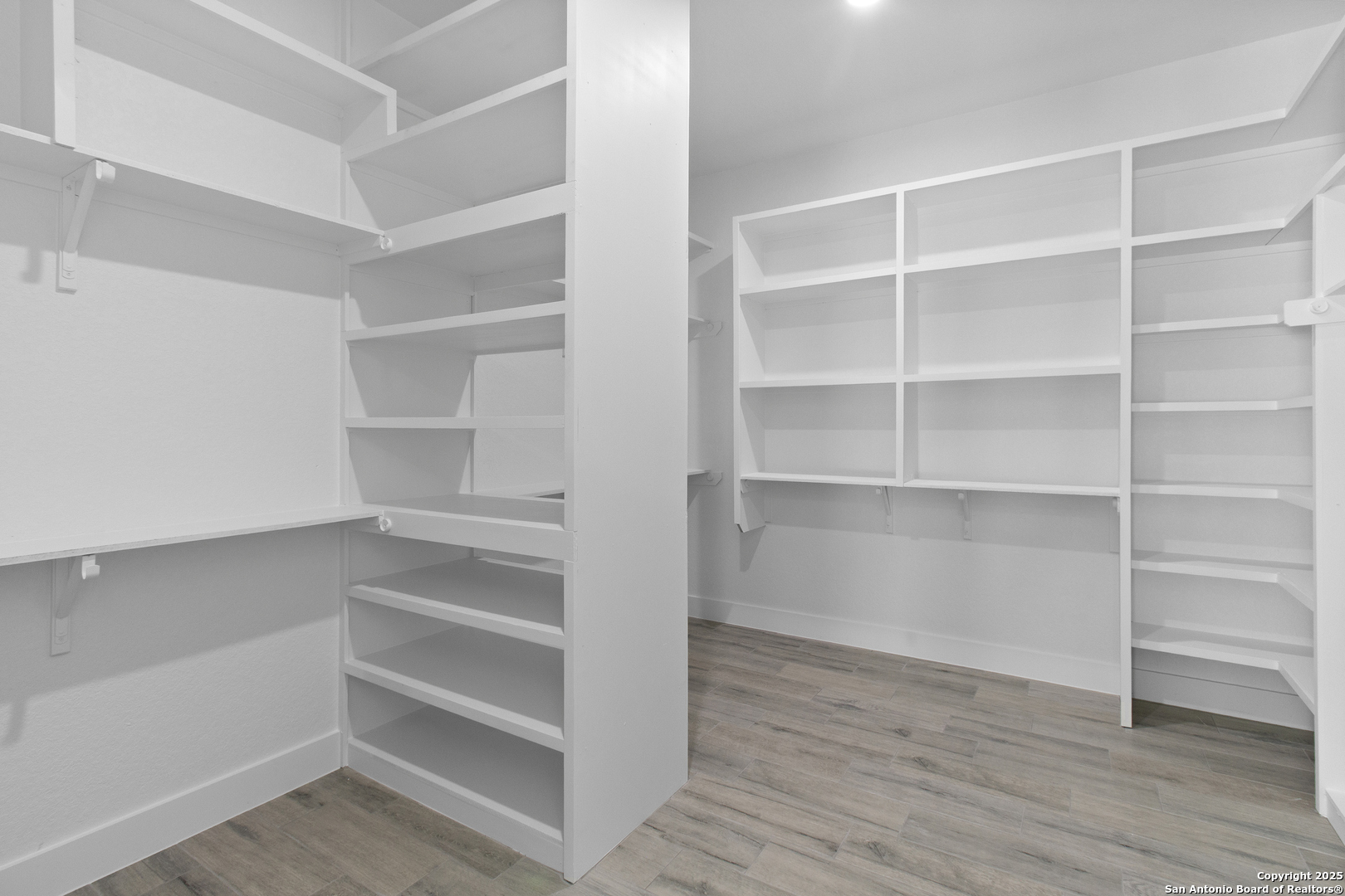 116 Western Way Adkins, TX 78101 - Photo 45 of 50 a view of walk in closet with empty racks