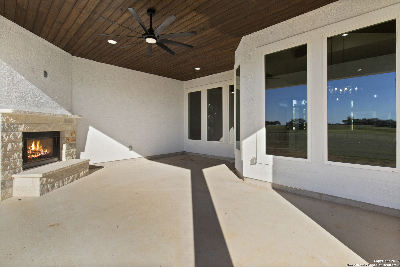 116 Western Way Adkins, TX 78101 - Photo 46 of 50 a lobby with a couch and a fireplace
