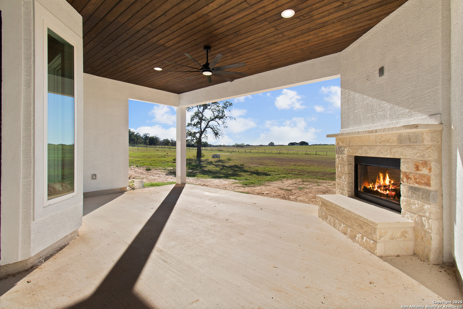 116 Western Way Adkins, TX 78101 - Photo 47 of 50 a view of a porch and fireplace
