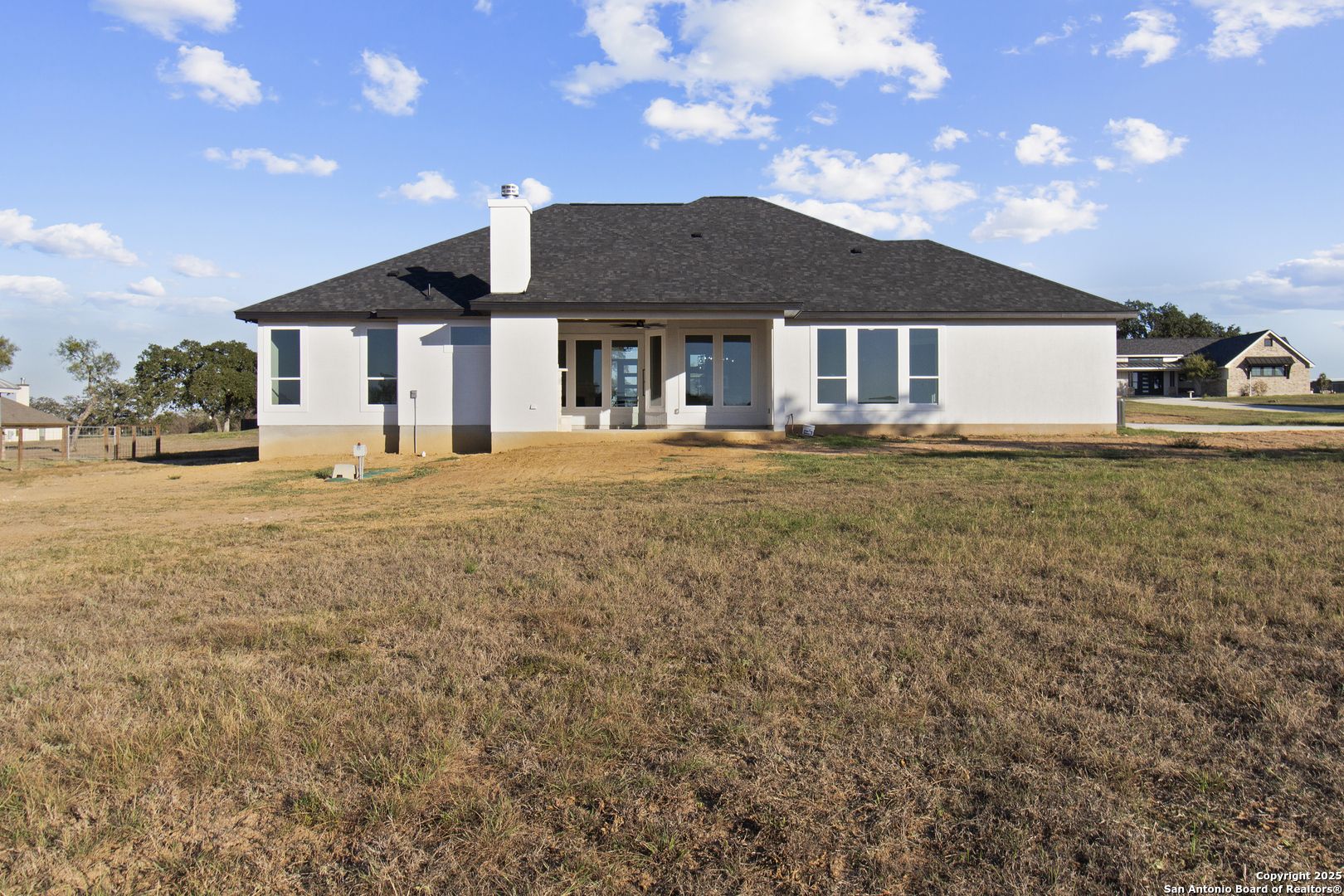 116 Western Way Adkins, TX 78101 - Photo 50 of 50 a front view of a house with a yard