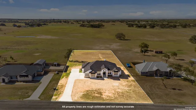 swimming pool view with a lake view